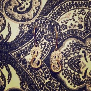 14 karat gold infinity earrings.